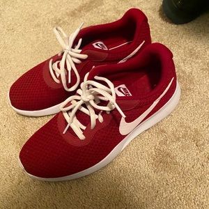 Burgundy Nike sneakers